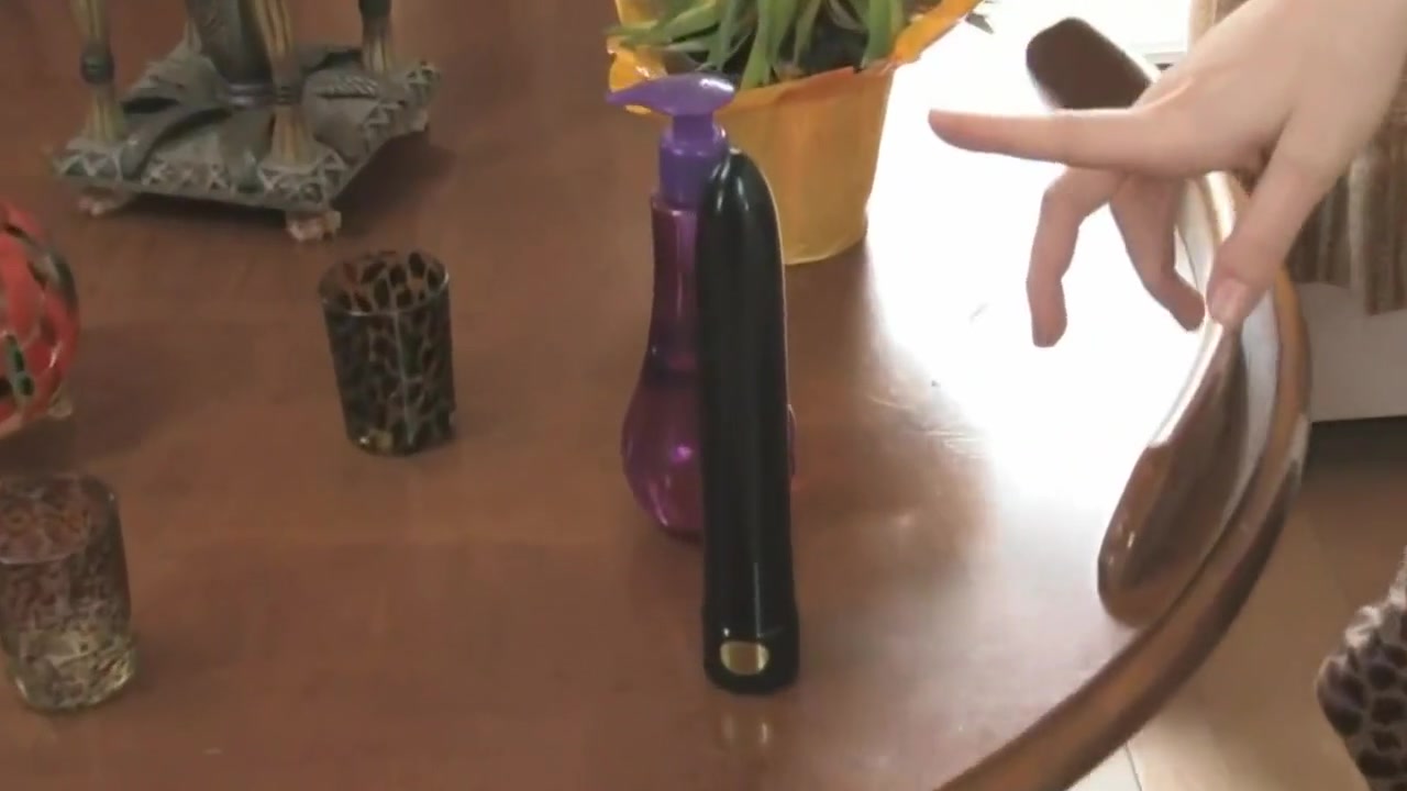 Sheila Faye - A Slut With Dark Hair Puts On A Sex Toy