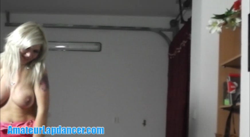 Busty lapdancer plays with hard cock