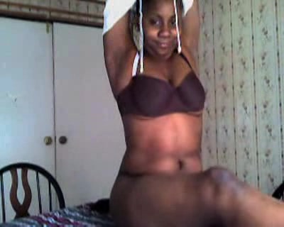 Black girl shows her sweet chocolate skin for the camera