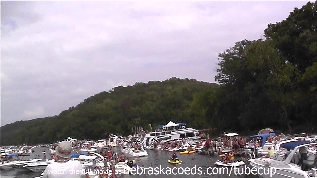 girls in bikinis and topless in public party cove