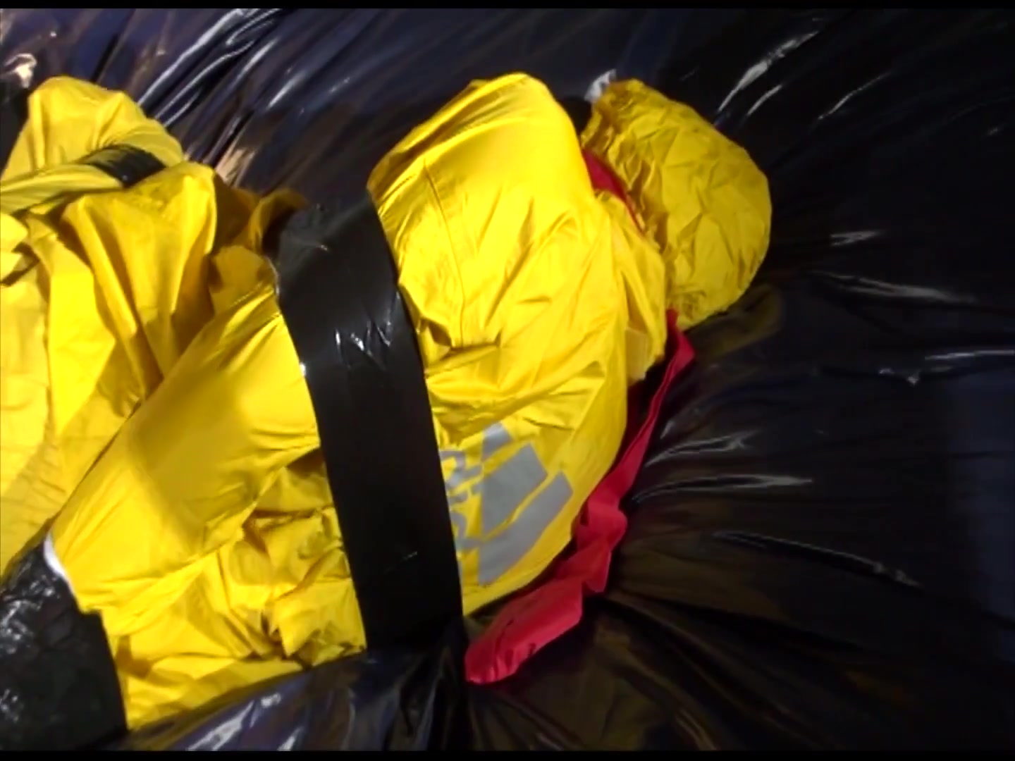 Get 2 Archivevideos With Sonja Enjoying Bondage In Her Shiny Nylon Rainwear