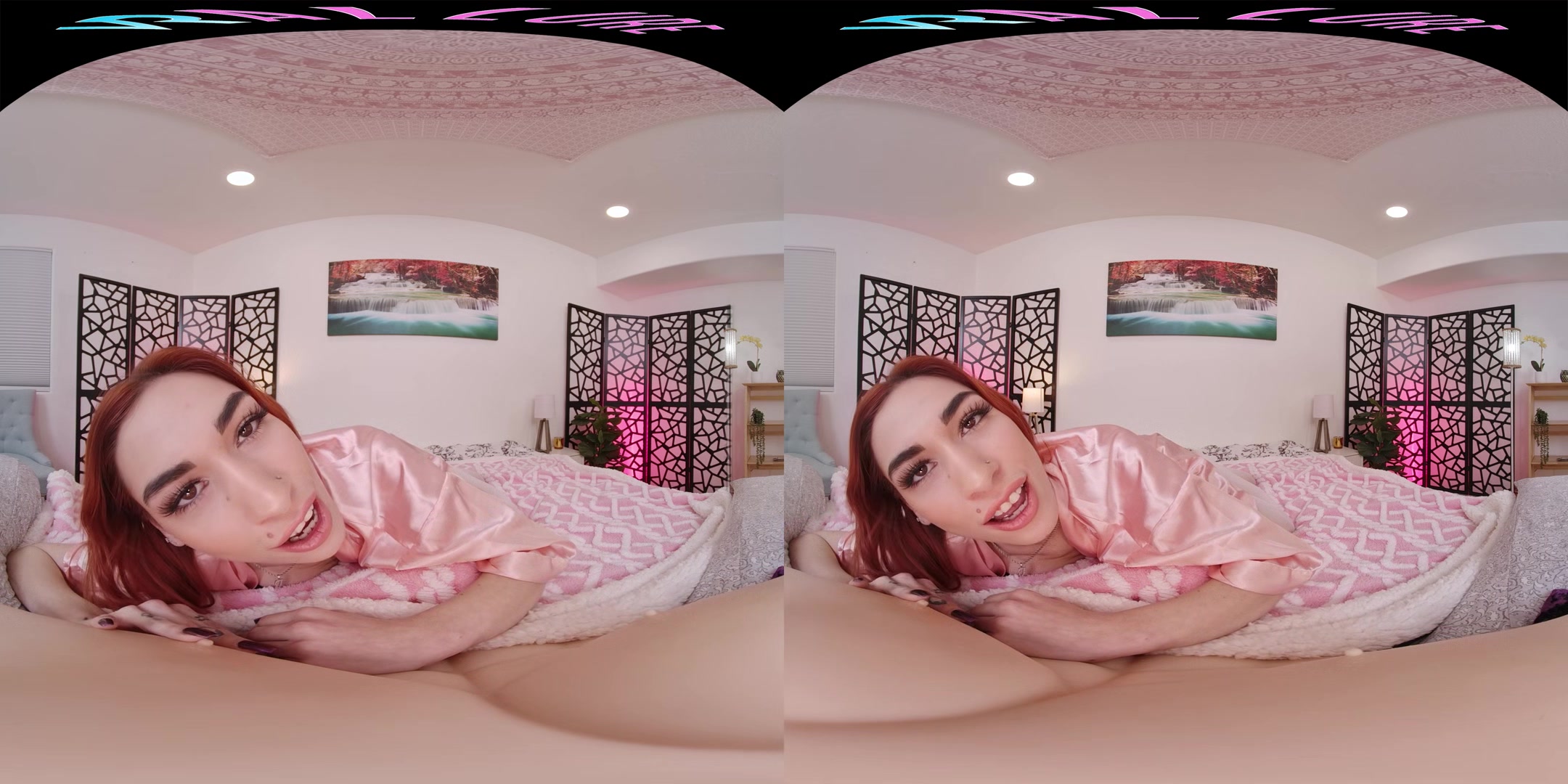 Sexy little redhead plays with her sex toy in virtual reality