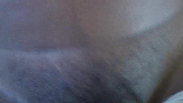 Black skinned girl has something inside her pussy