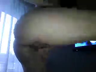 Brunette young gal stripping for her boyfriend on webcam