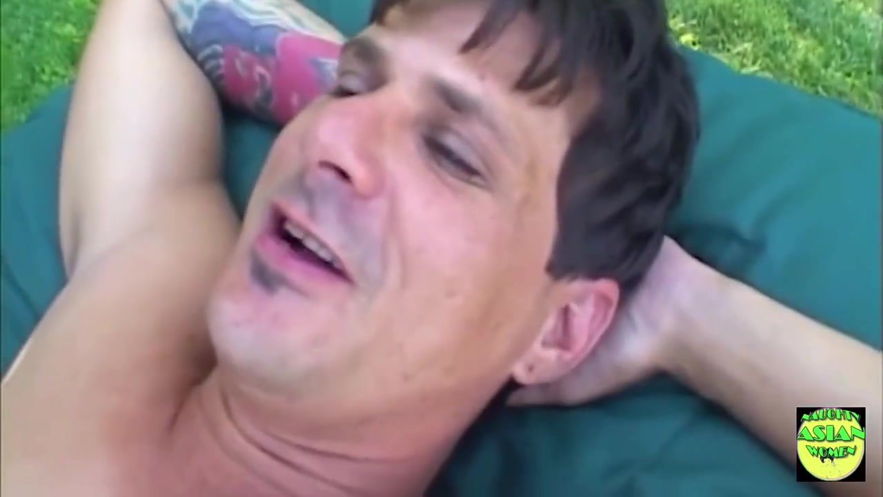 A Skinny Asian Outdoors Gives A Guy A Blowjob Before Riding His Big Cock