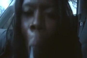 Ebony woman taking a black cock deep in her mouth