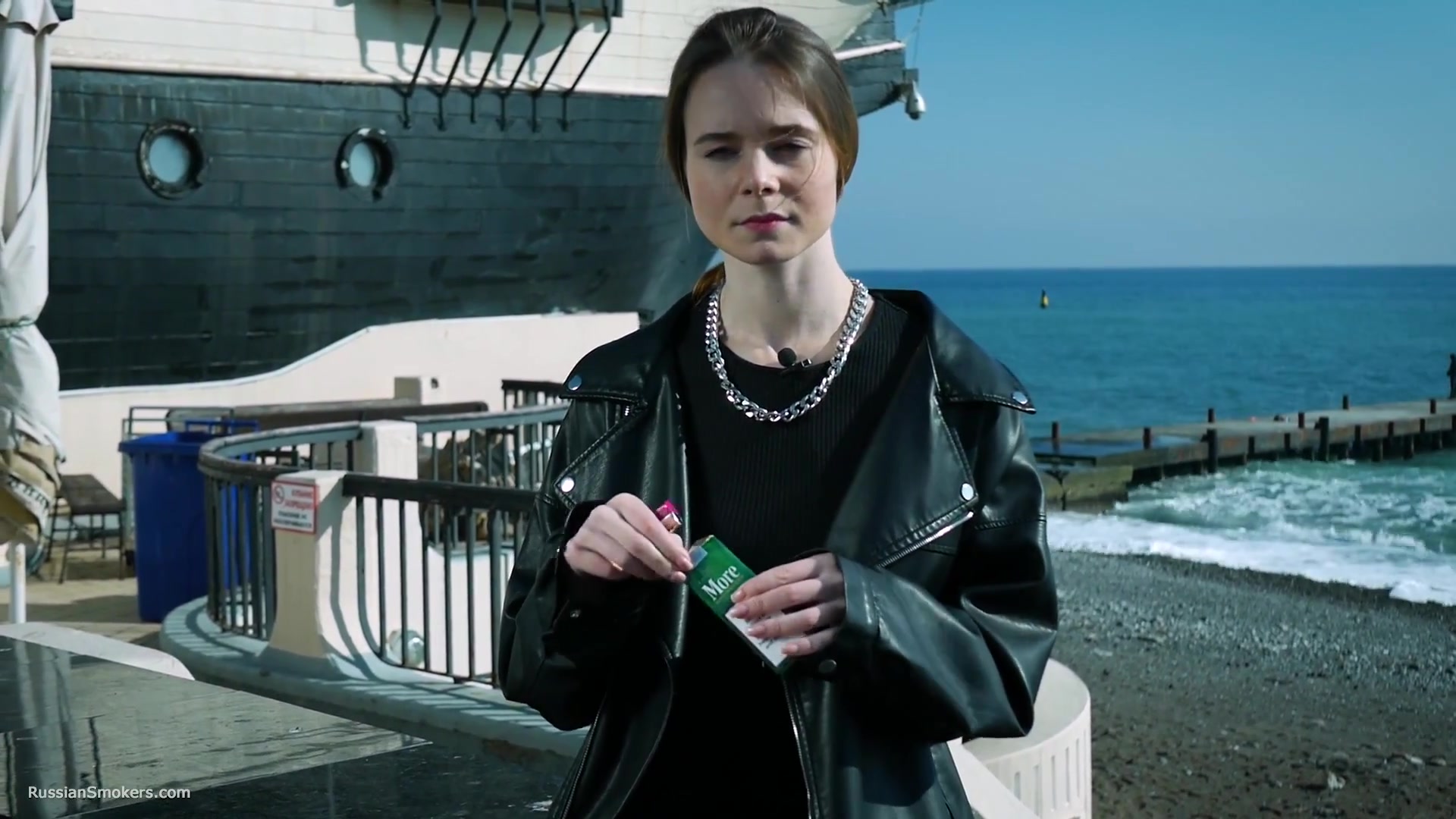 Smoking Strong Brown 120mm Cigarette Near The Beach