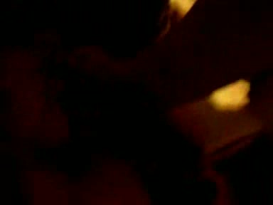 Two ebony lezzies making out on a bed
