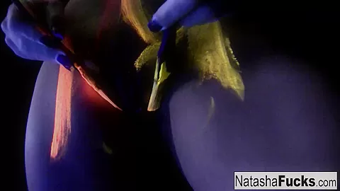 Natasha Nice in Busty Natasha Shoots A Fun And Sexy Black Light Video - NatashaNice