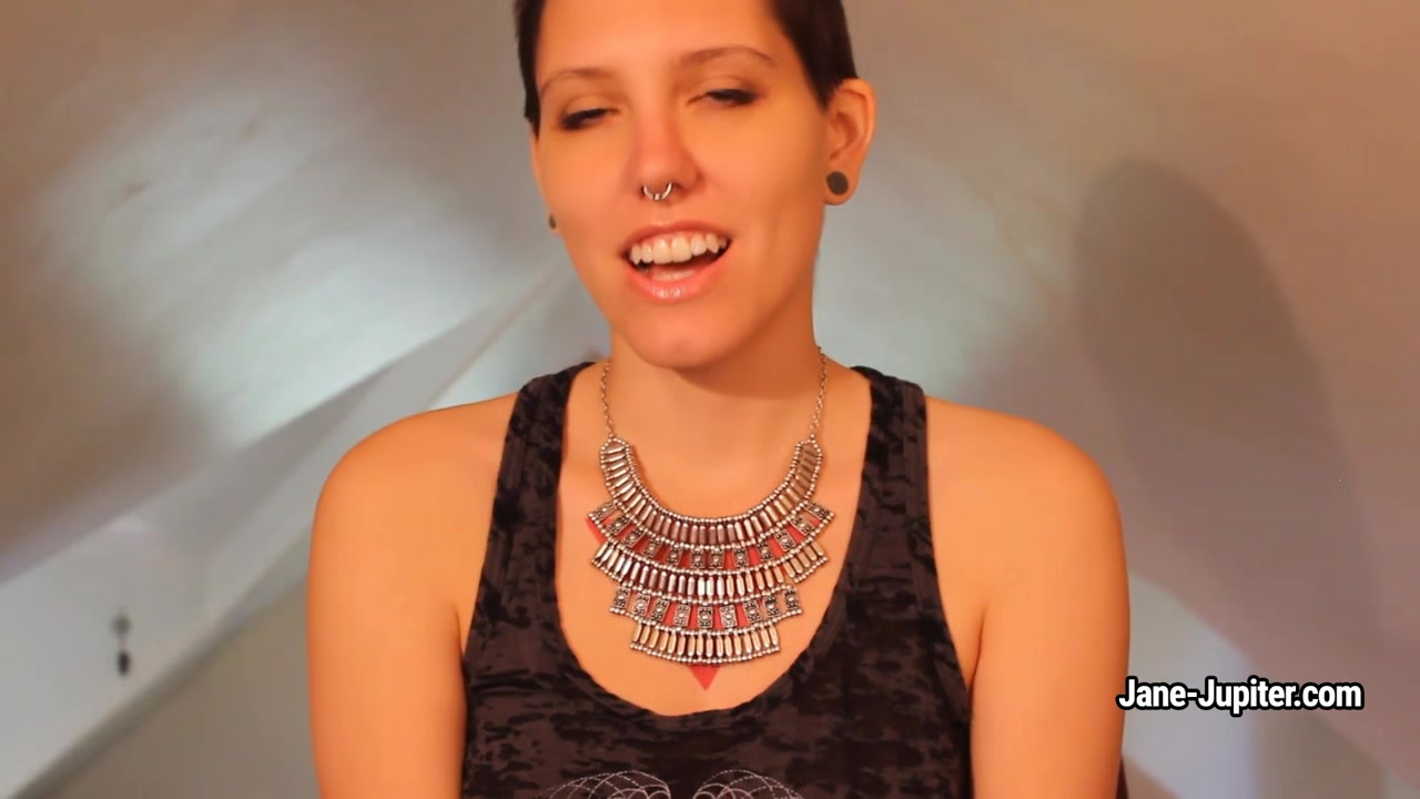 Jane Jupiter shows her pierced tits and hairy arm-pits