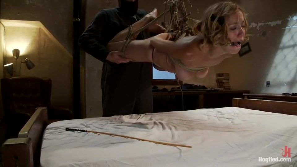 Helpless Blonde in hogtie struggling through orgasm after orgasm.