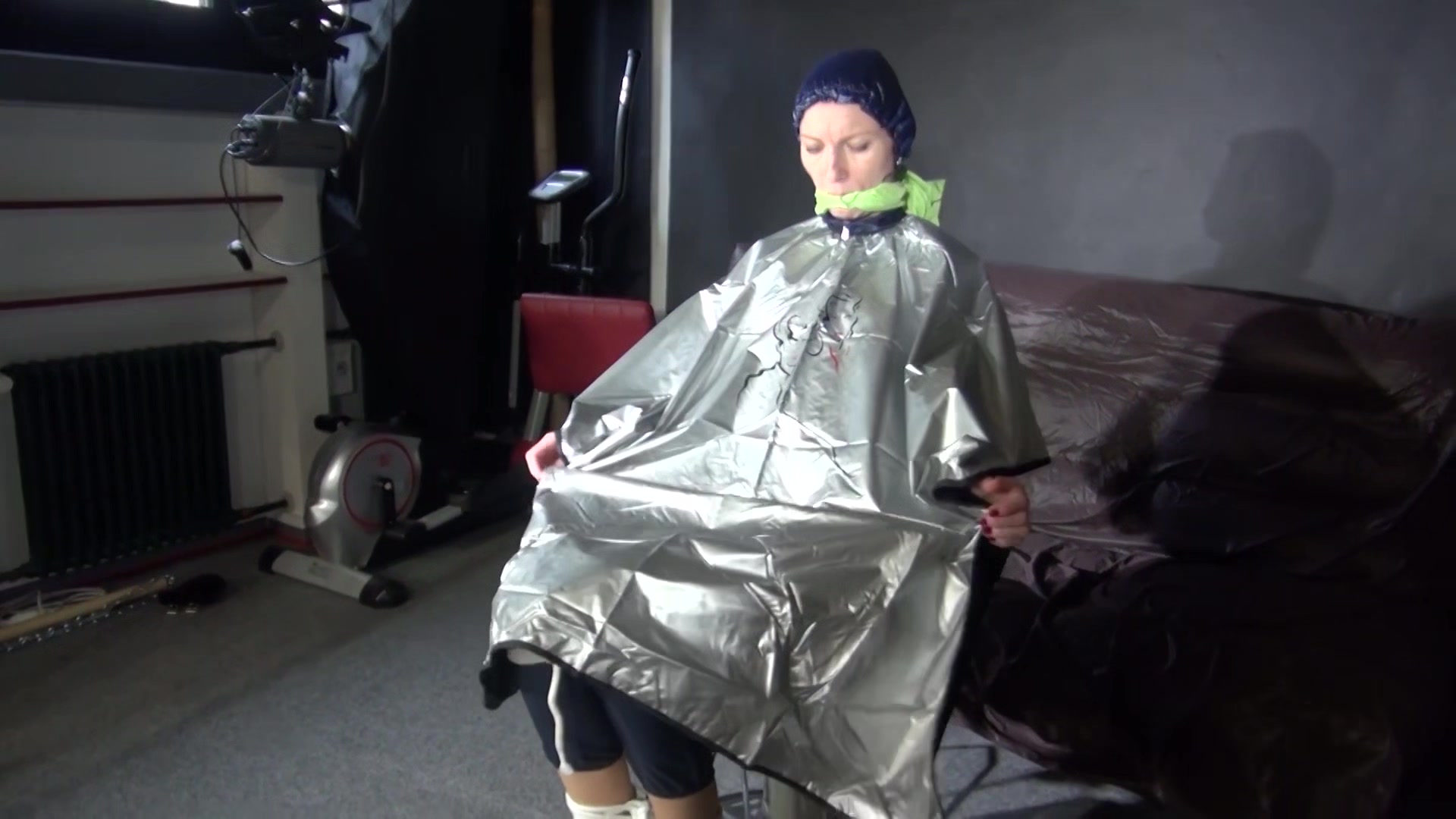 Sexy Ronja Being Tied, Gagged And Hooded On A Chair With A Clothgag Wearing Sexy Blue Shiny Nylon Rainwear (Video)