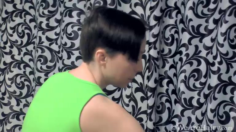 Trixie hangs her clothes and masturbates - WeAreHairy