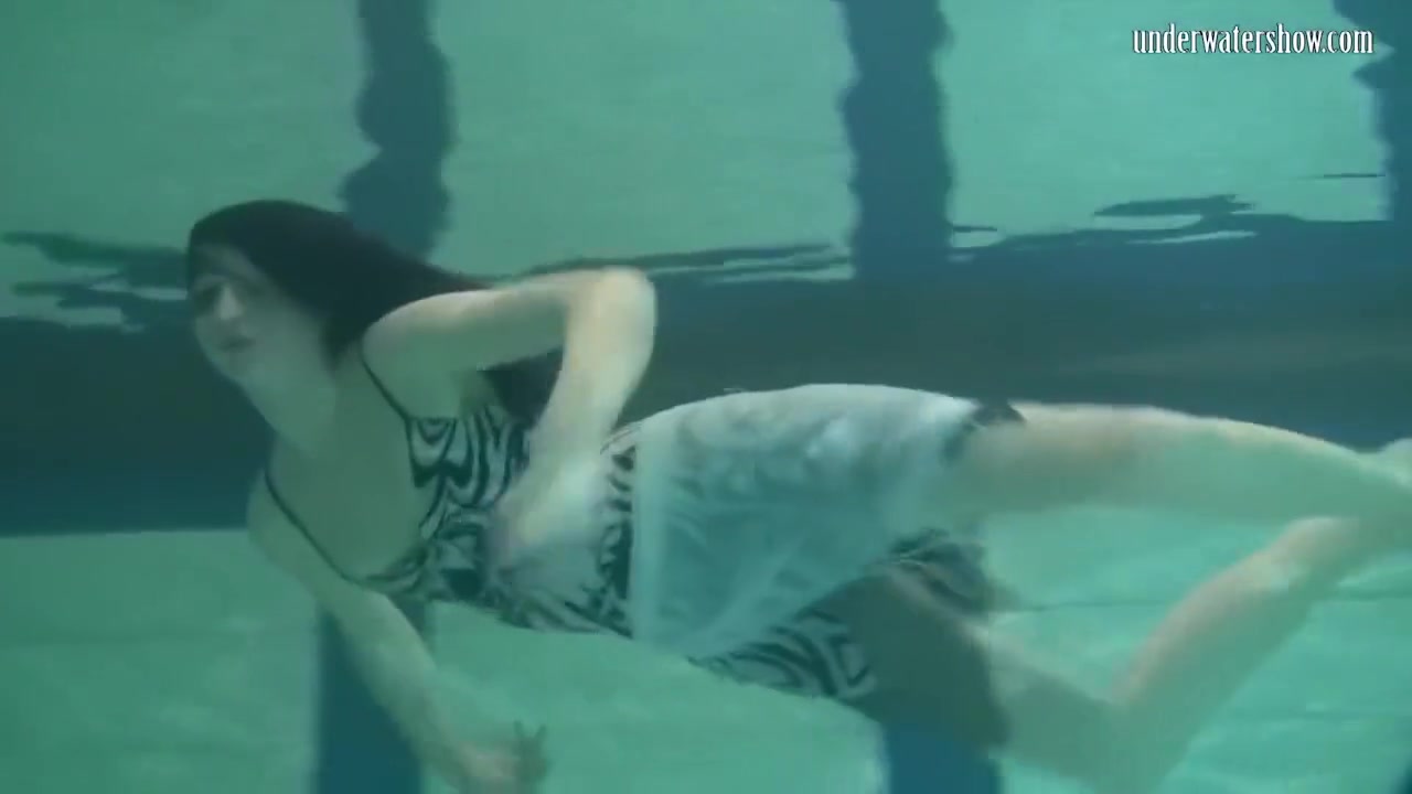 Dressed Up teen 18+ Irina Barna Swims Sexy In The Pool