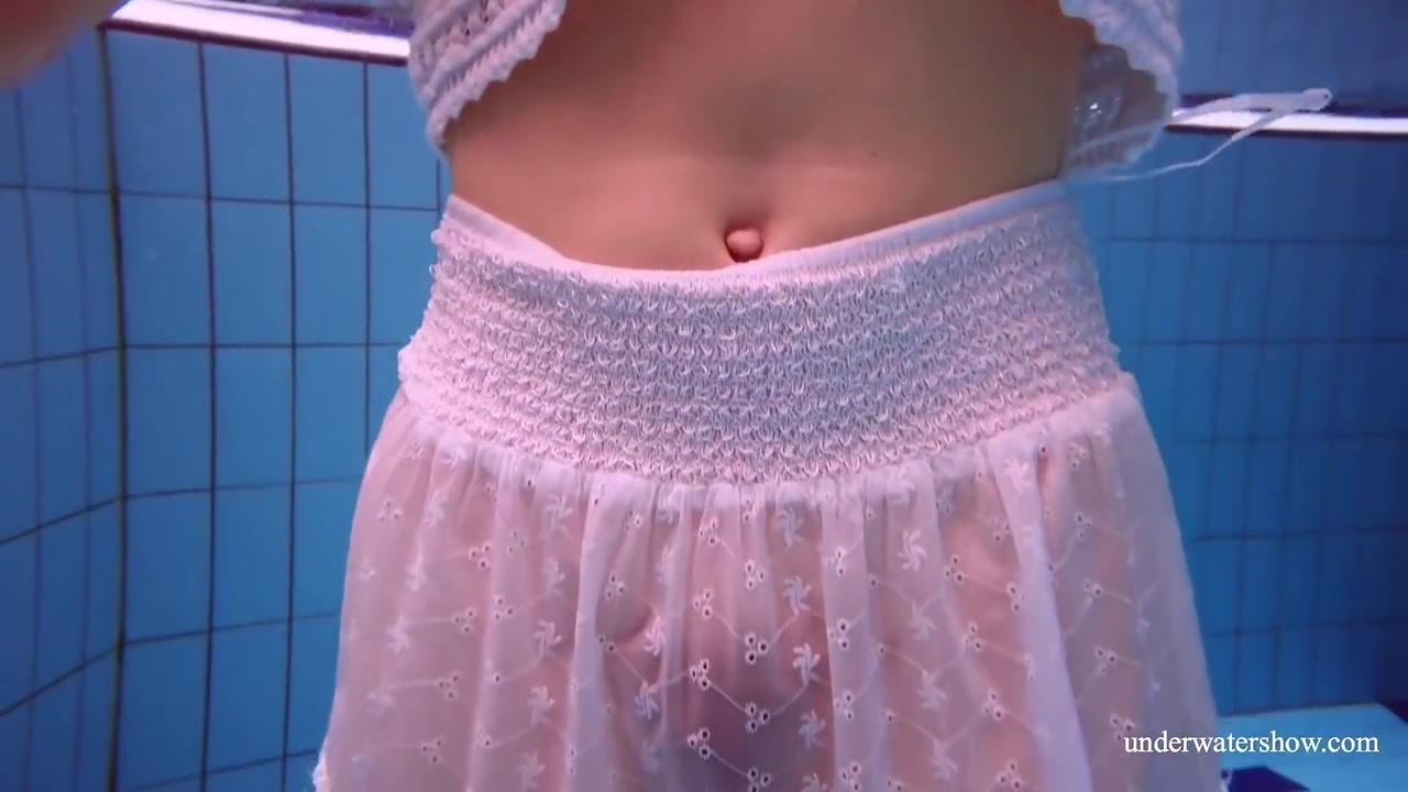 Redhead Marketa In A White Dress In The Pool