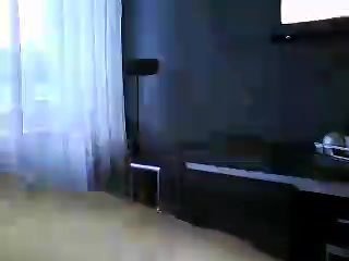 Brunette young gal stripping for her boyfriend on webcam