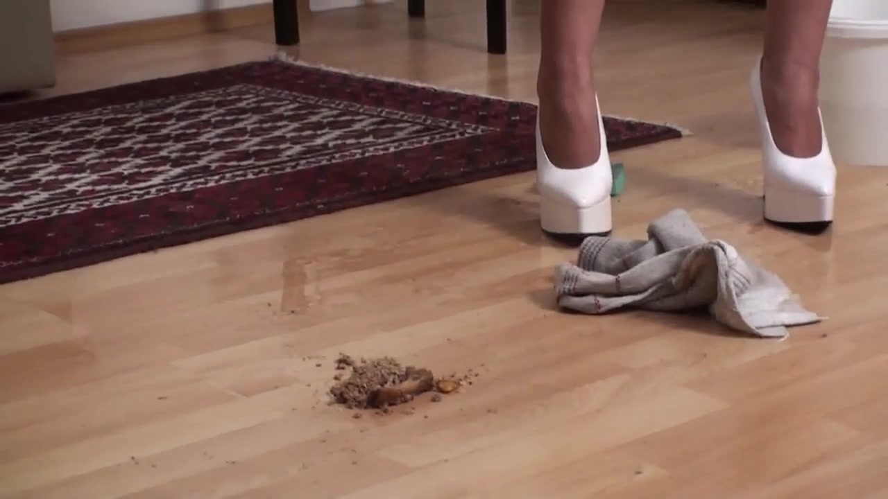 House slave cleaning his mess by Foot Girls