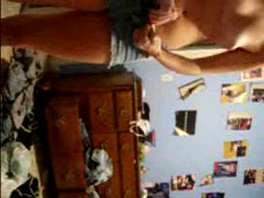 Blonde young girl taking her clothes off slowly
