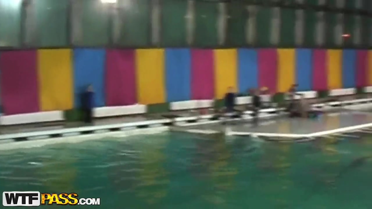 Cute and young brunette babe Natasha is getting seduced by her workmate at dolphinarium for naughty fuck.
