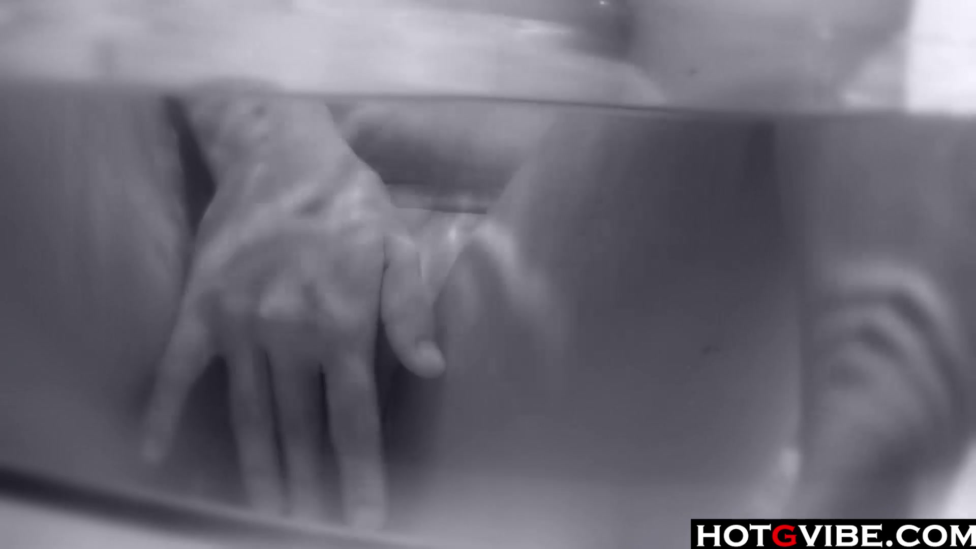 Petite Asian plays with her toys in the bathtub