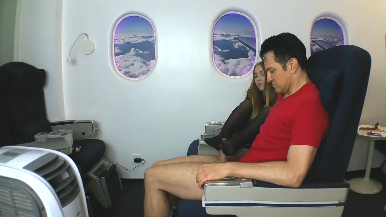 Stewardess gives nylon footjob in plane by Foot Girls
