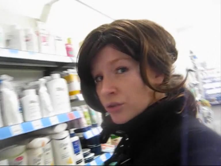 Brunette busty exhibitionist masturbating in public
