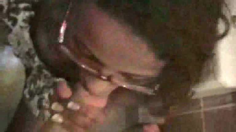 This Ebony has a seductive look on her face when she sucks dick