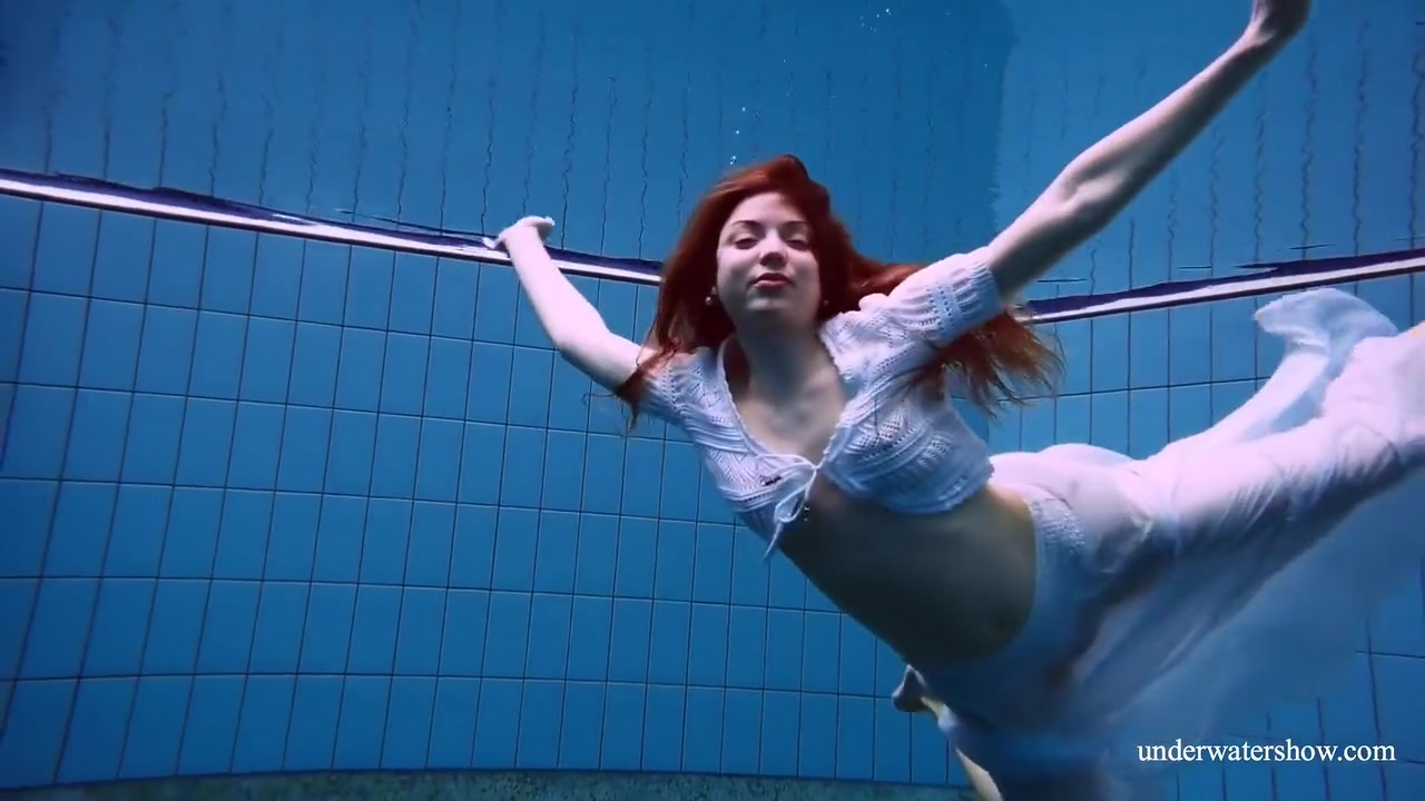 Redhead Marketa In A White Dress In The Pool