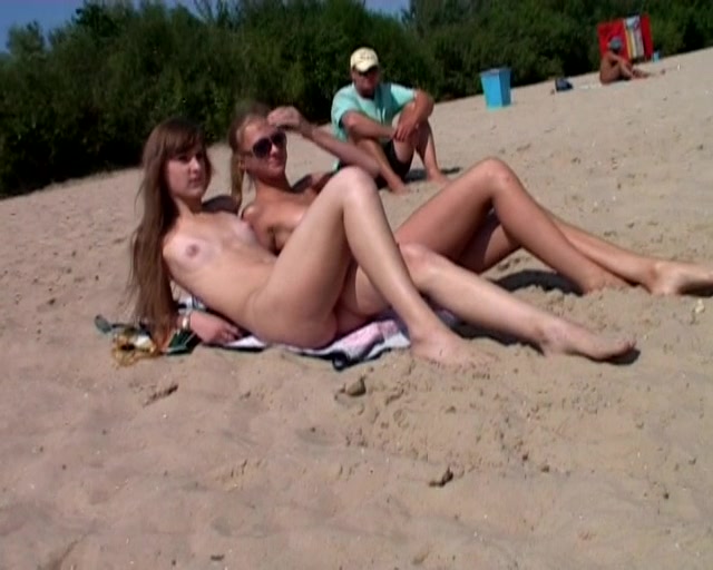 Real beach nudist pussies stretching on the sand