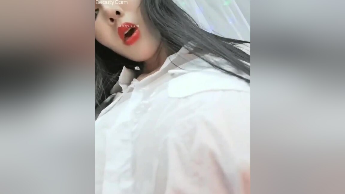 Beautiful Asian Babe Playing On Camera