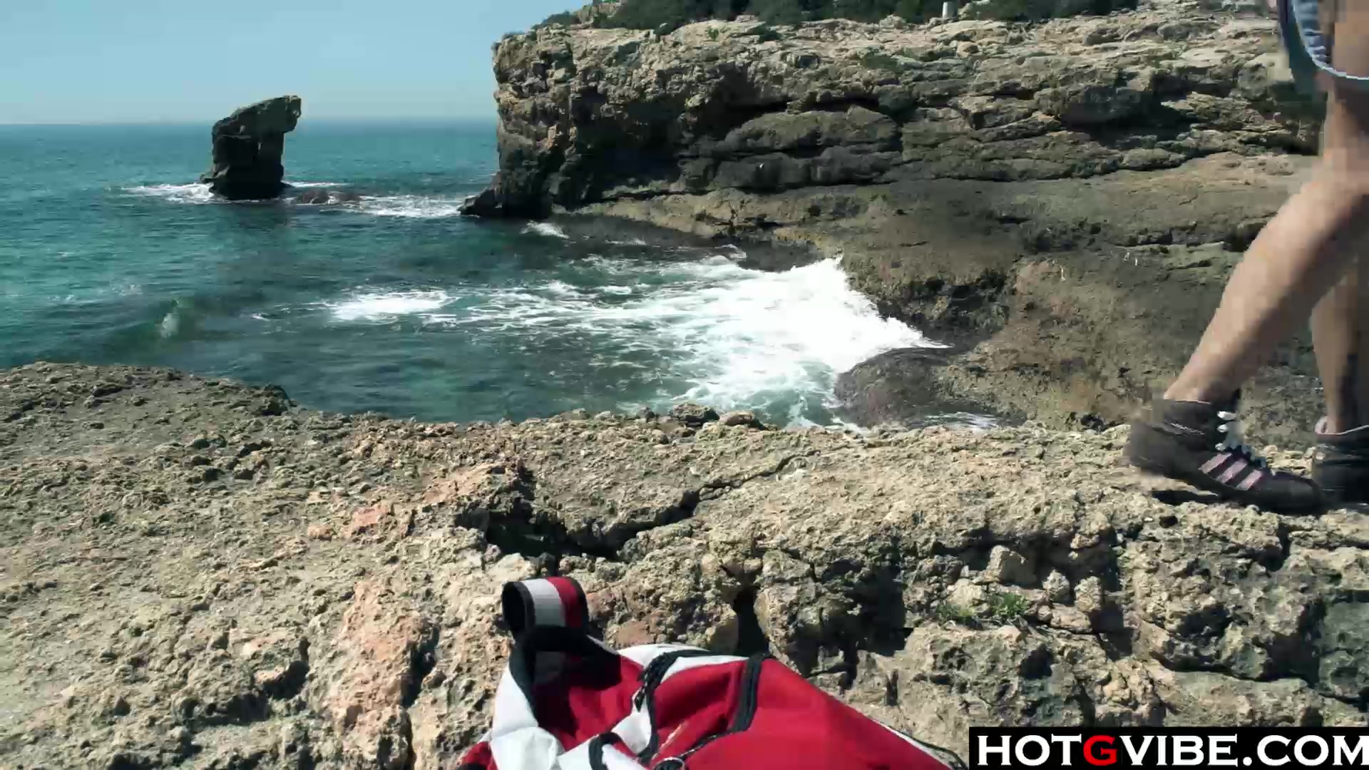 Slim Spanish Latina fucks herself on the beach