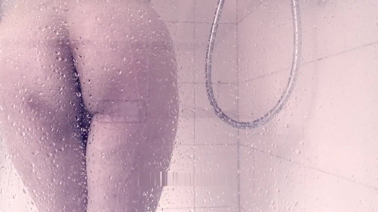 SIssy Tiffani masturbates in the shower