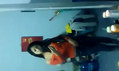 Asian slut films her naked boobies in the mirror