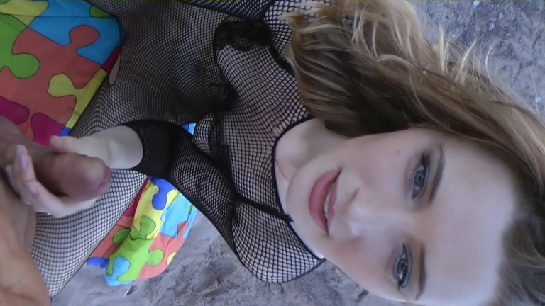 Girl in fishnets blowing