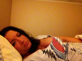 Raunchy babe exposing her juggs on camera and fucks with a dildo