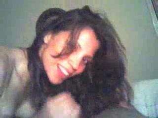 Long-haired brunette sucking on cock like it's her last time