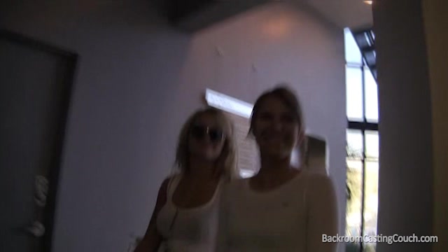 Two girls sharing on lucky dude's cock at a porn casting