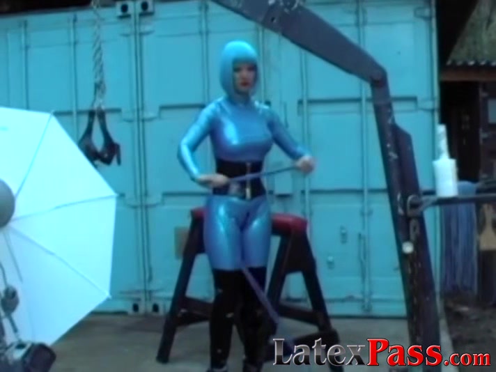 Redhead smoker tries out latex behind the scenes