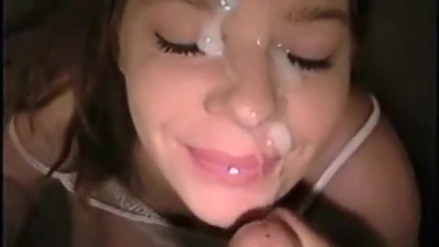 Amazing redhead receives a load of cum on her face