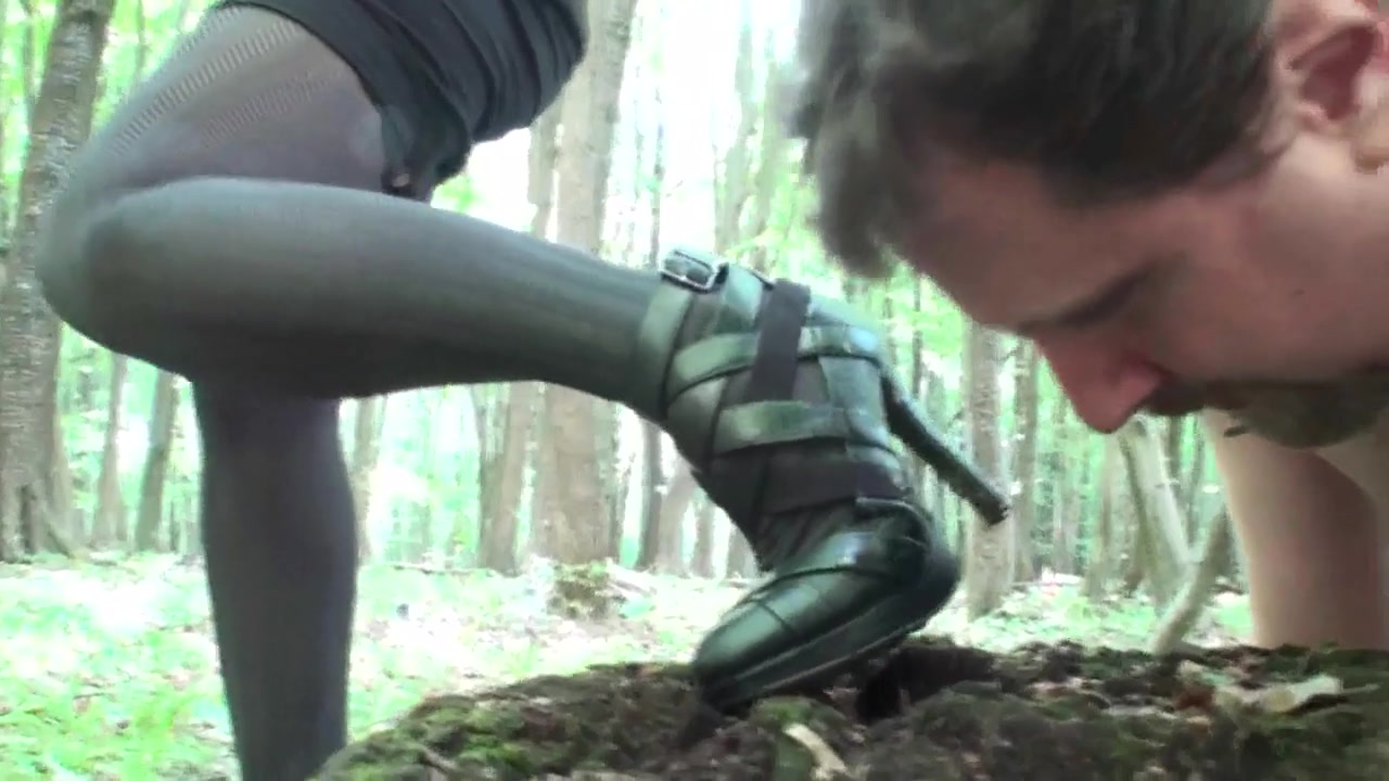 Mistress punishing her slave by putting high heels inside his mouth by Foot Girls