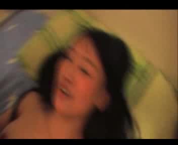 Asian girl gets her hairy pussy pounded on the bed