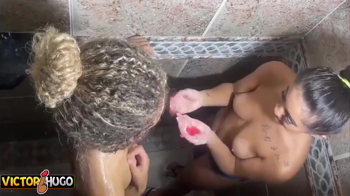Two Sexual Young Women Enjoying A Hot Shower