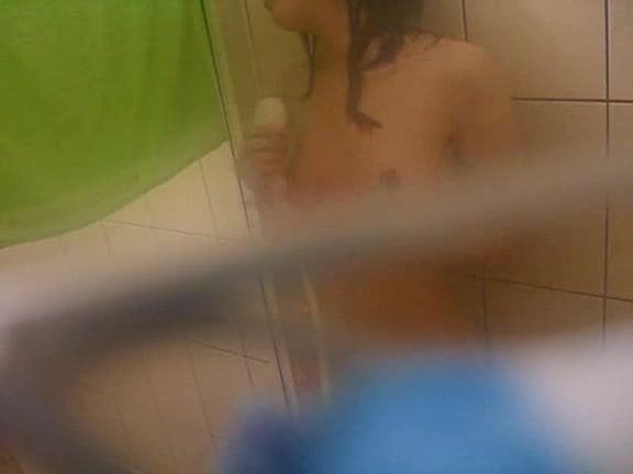 Young Asian babe caught naked in the bathroom by horny