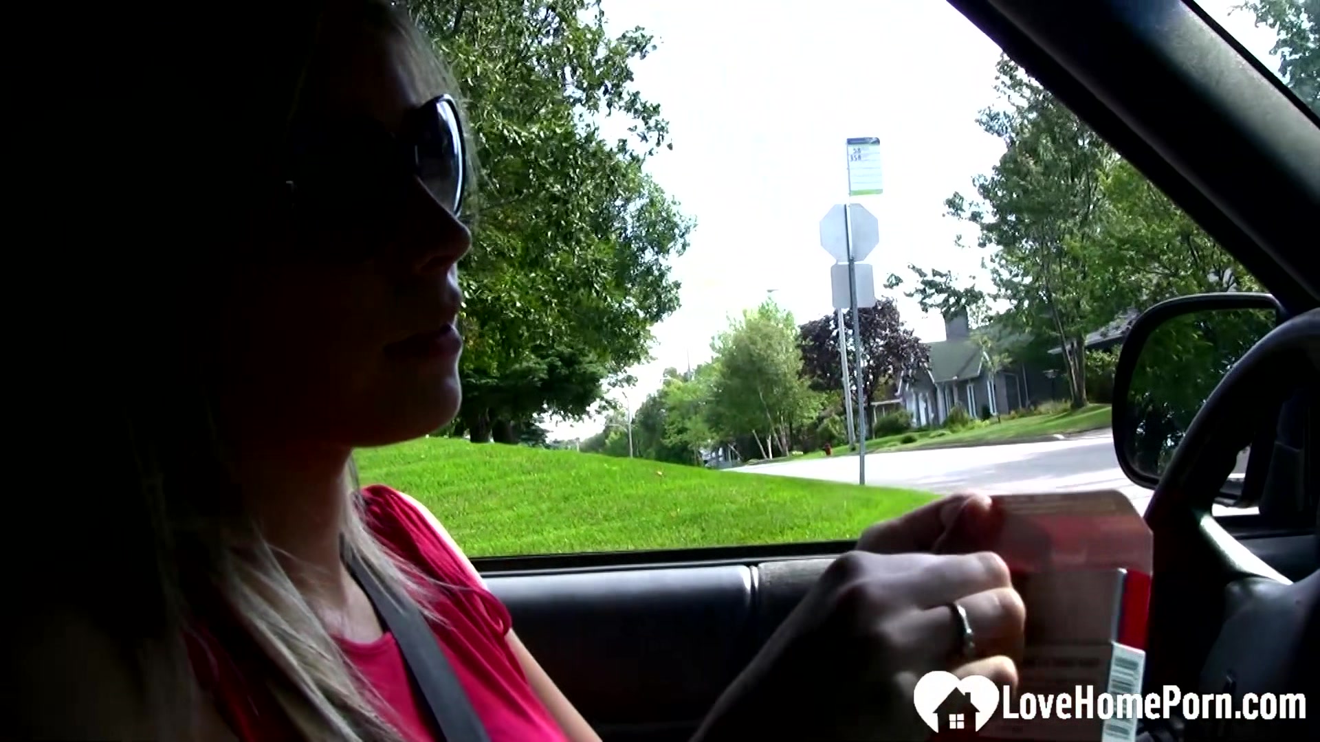 Sexy stepmom shows off feet while driving