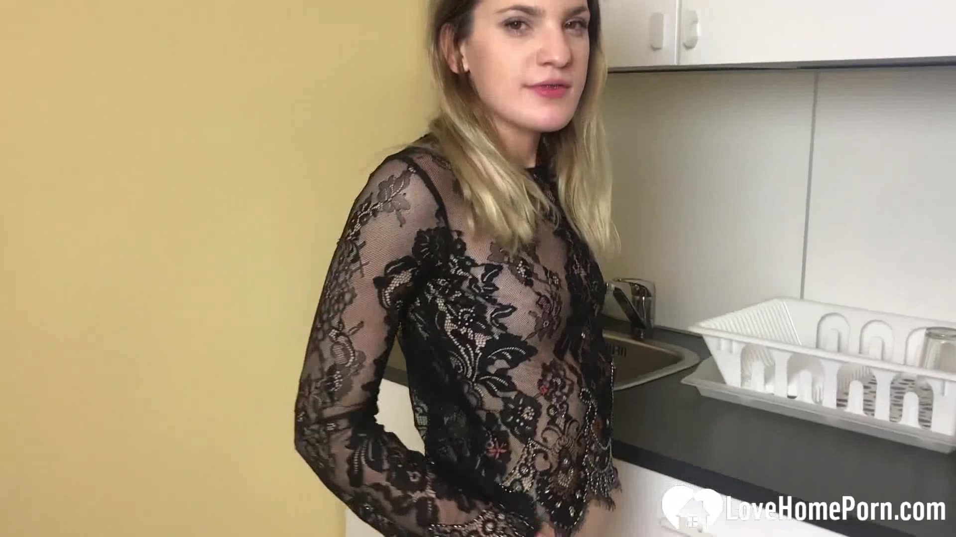 Blonde hottie masturbates with legs wide spread