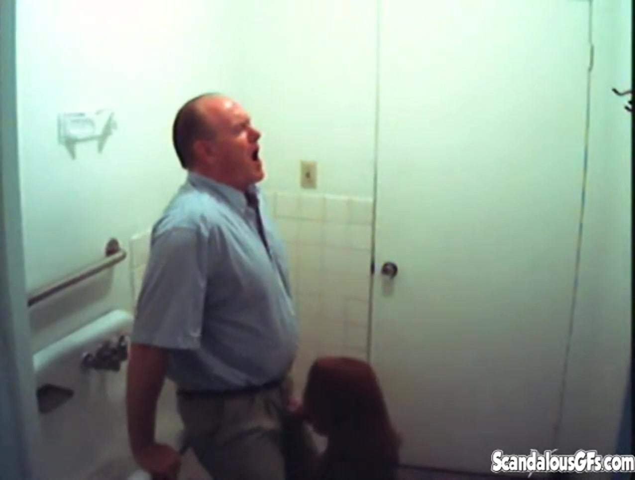 Bathroom slut sucks dick in restroom