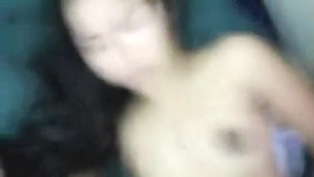 Young Latina spreading her legs and masturbating with a sex toy