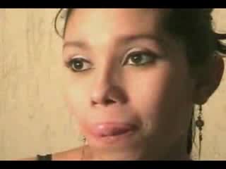 Latina woman touches her breasts and masturbates