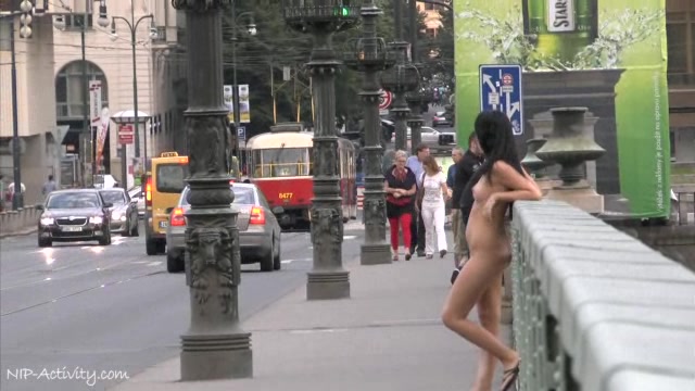 Kinky chick Tara walks naked in public