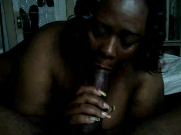 Black wife gives a head to this enormous black cock